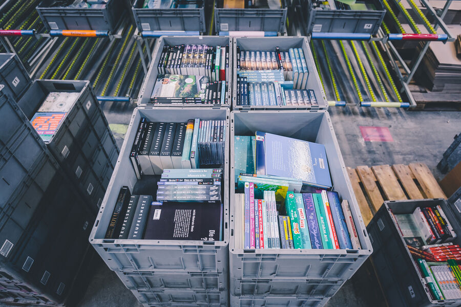 Books in transport boxes in preparation for shipment