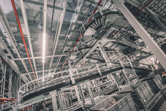 A transport conveyor system in an arvato warehouse